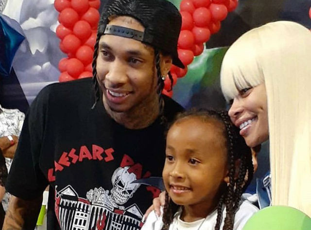 Tyga with his ex and his son.