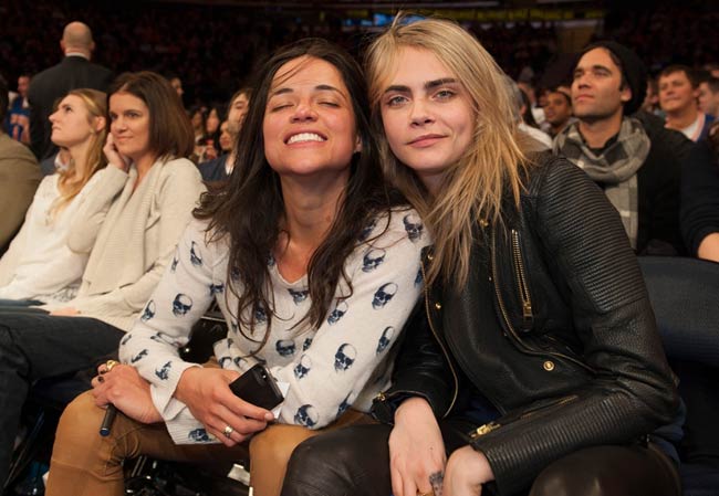 Michelle Rodriguez and Cara Delevingne together in a basketball game.